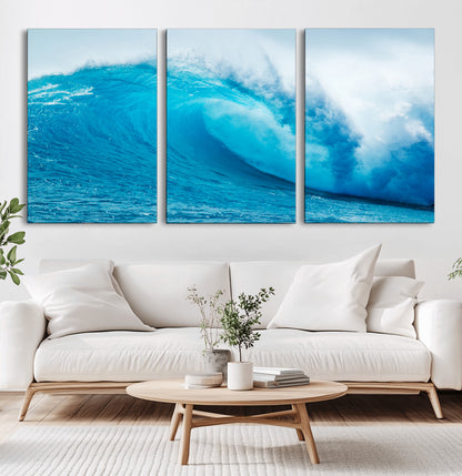 Vibrant canvas of a powerful curling ocean wave in tropical blue tones, perfect for coastal or surf-inspired decor settings.