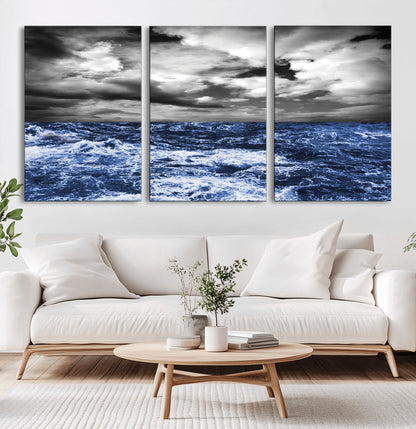 Moody canvas wall art of a stormy ocean under a dramatic black-and-white sky, perfect for bold or coastal-style interiors.