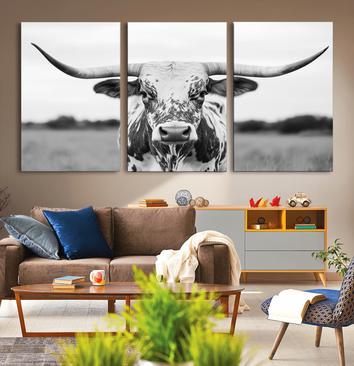Capture the strength and elegance of nature with this striking black and white portrait of a longhorn cow. Its powerful presence makes a bold statement in any room.