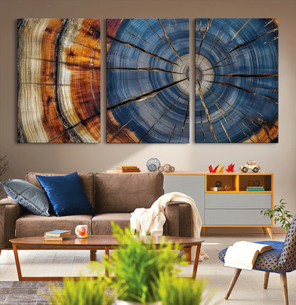 A stunning close-up view of a tree trunk, showcasing the intricate growth rings in a vibrant mix of warm browns, cool blues, and hints of natural texture.