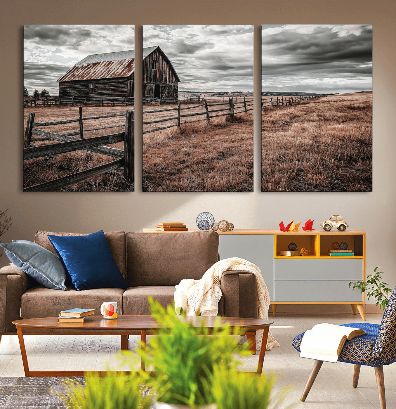 Framed canvas of a rustic barn under a moody sky with weathered fence and dark fields, ideal for farmhouse or rural-style wall decor.