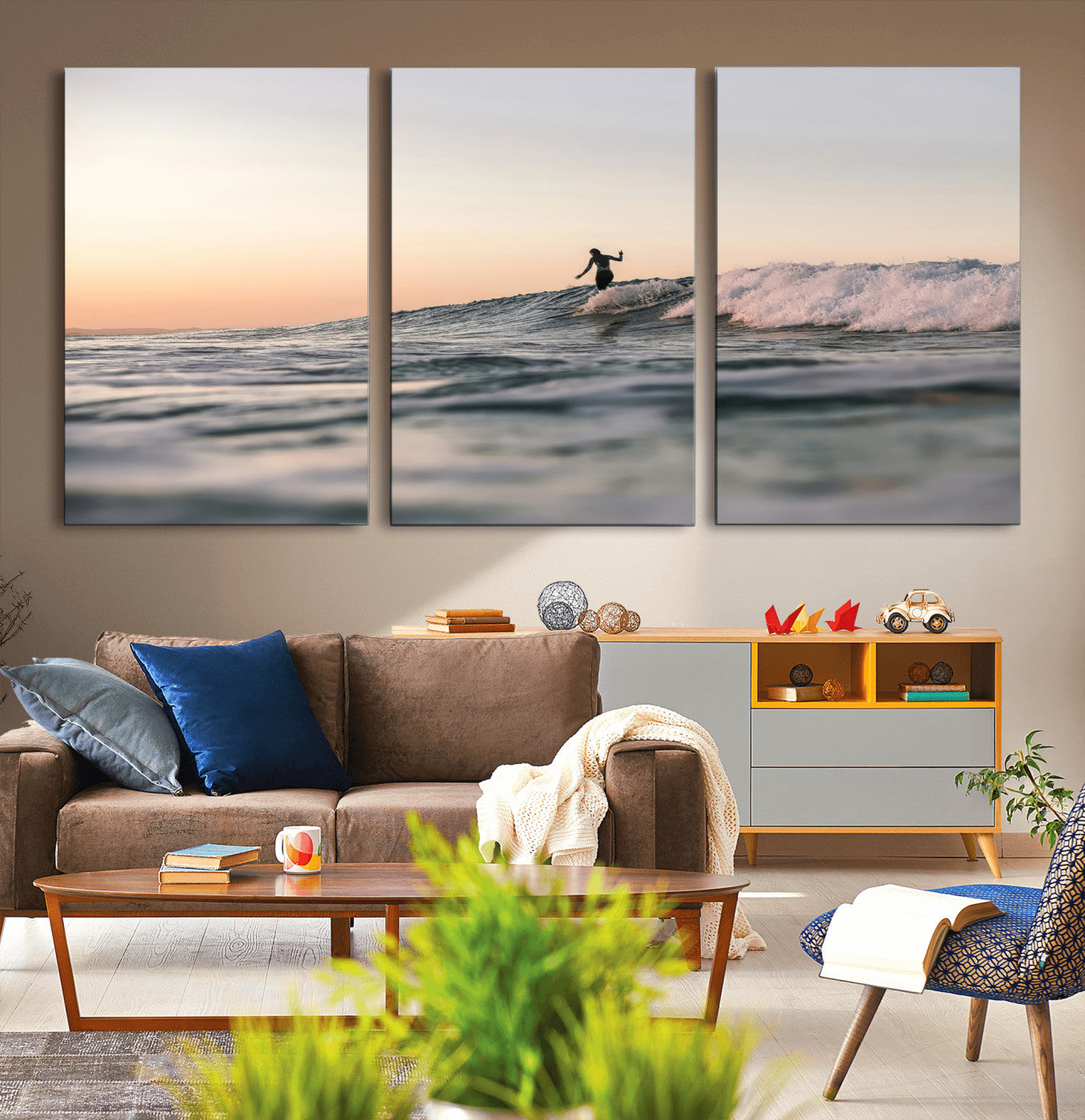 Framed canvas of a female surfer balancing on a wave at sunset, perfect for serene surf or ocean-inspired coastal decor.