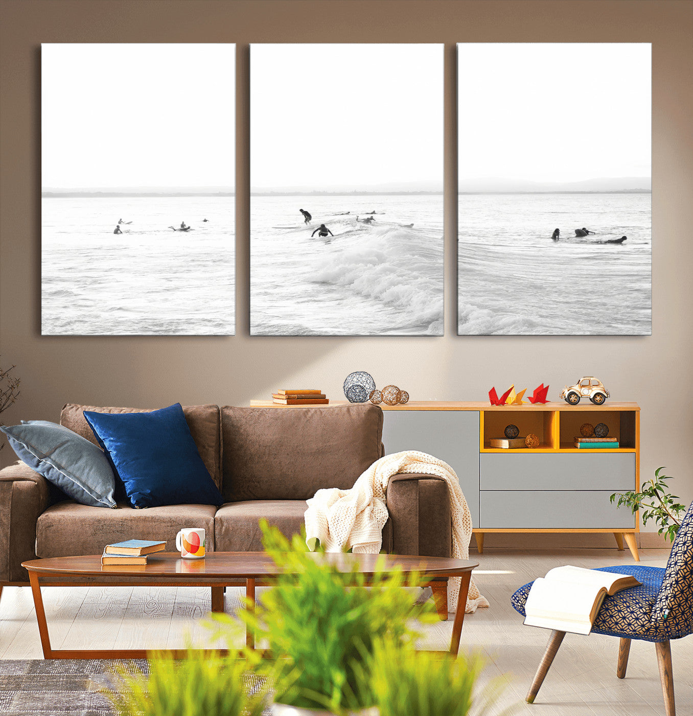 Monochrome photo of surfers riding and waiting on ocean waves, ideal for surf-themed or coastal energy wall decor.