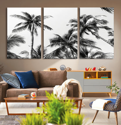 Black and white canvas of tall palm trees in moody tones, perfect for modern tropical minimalist or coastal-style home decor.