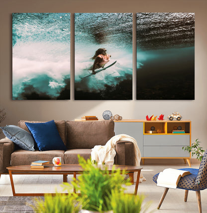 Vibrant underwater photo of a female surfer diving through turquoise waves, perfect for coastal boho or surf-inspired home decor.