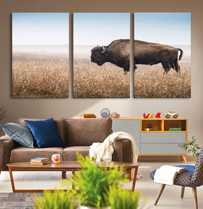 A majestic bison standing in an open prairie field, its strong form blending into the golden grass under a vast blue sky, evoking the wild spirit of the American plains.