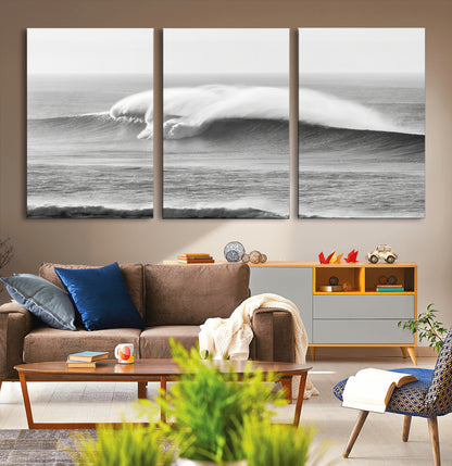 A dramatic black and white ocean wave crashing with immense force, capturing the raw power and movement of the sea in a bold seascape.