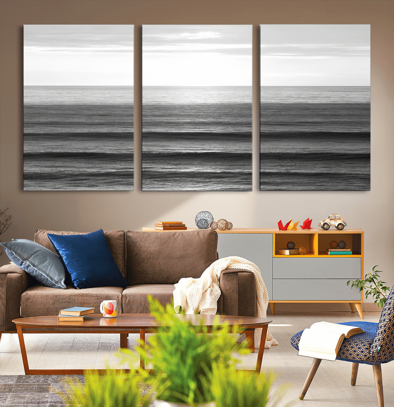 Minimalist black and white ocean view with layered waves reflecting sunlight, evoking a sense of calm and coastal serenity.