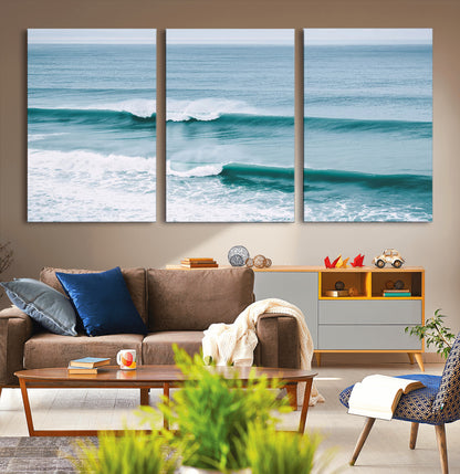 Powerful ocean waves rolling towards the shore, their turquoise hues blending with white sea foam under an open horizon, capturing the essence of the ocean's movement.