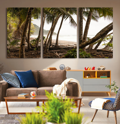 Dense tropical palm trees framing a sandy beach and ocean shore, ideal for jungle or coastal themed interior wall decor.