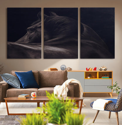 Close-up of a black horse with dramatic lighting on a dark background, perfect for rustic or masculine home decor.