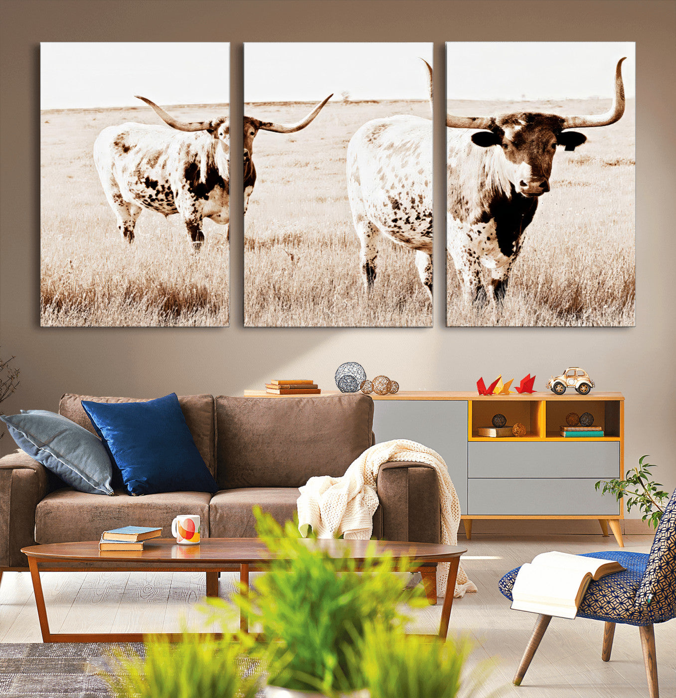 Two Texas longhorn cows standing in a sepia-toned pasture, evoking rustic charm perfect for farmhouse or western country interiors. (
