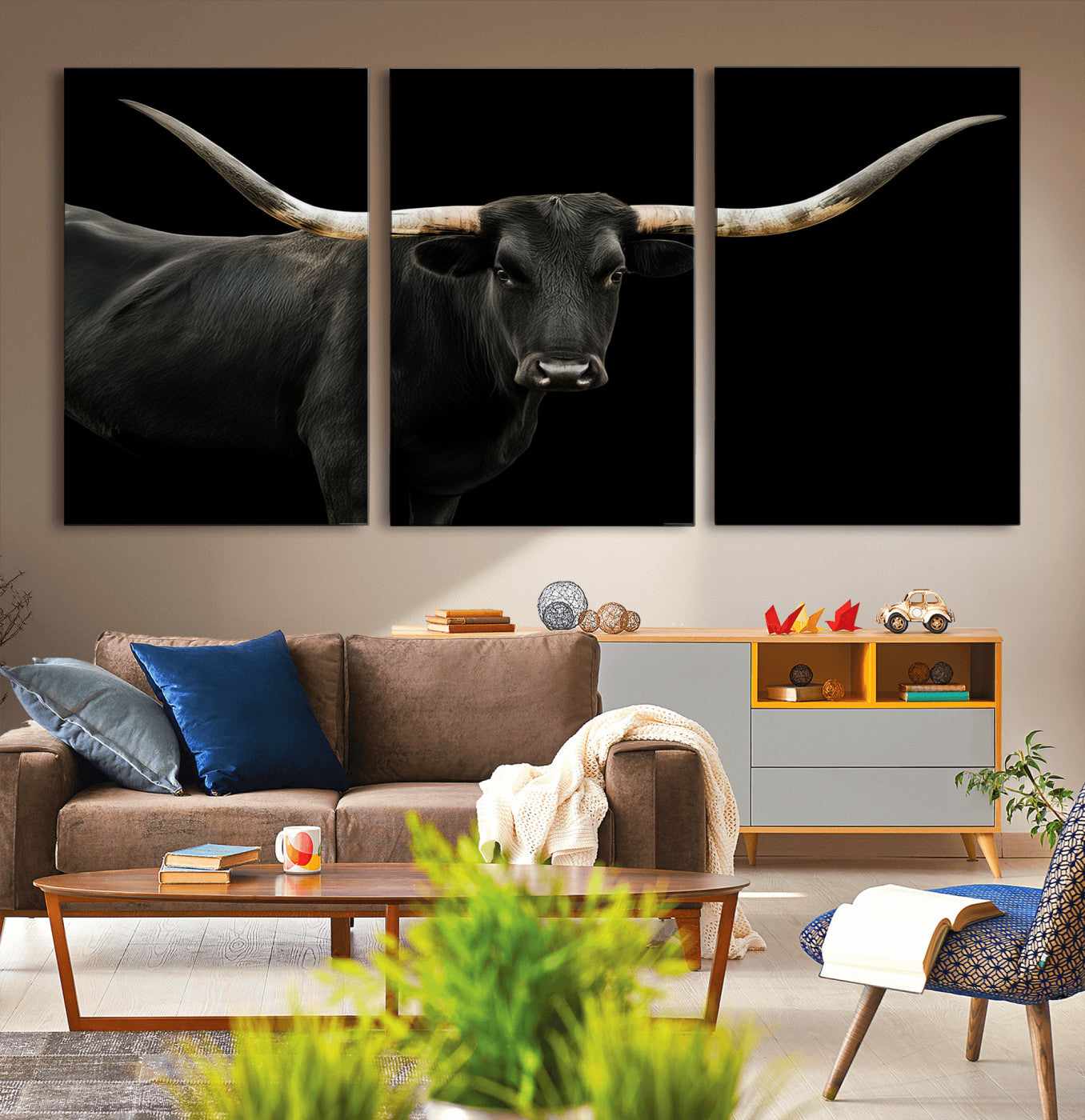 Close-up of a black Texas longhorn with large curved horns on black background, ideal for rustic farmhouse or modern western interiors.