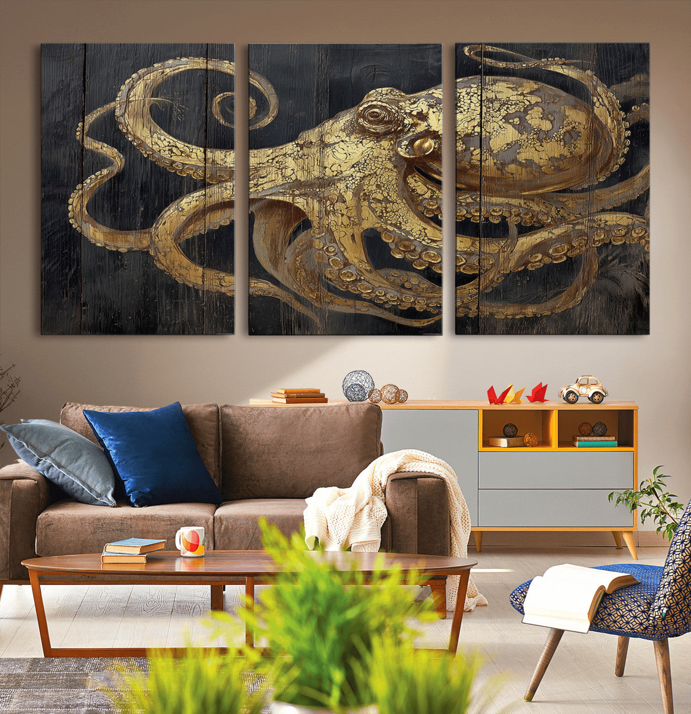 A detailed gold illustration of an octopus on black wooden planks, showing its intricate tentacles and textured skin in an artistic style.