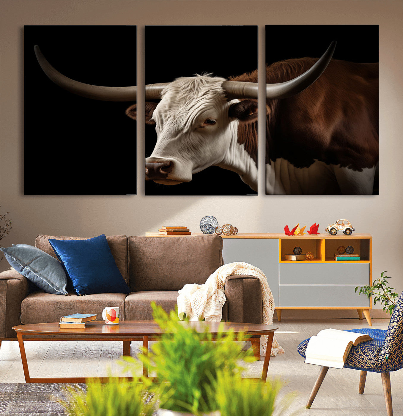 "Close-up of a brown and white longhorn cow with prominent curved horns against a black background."