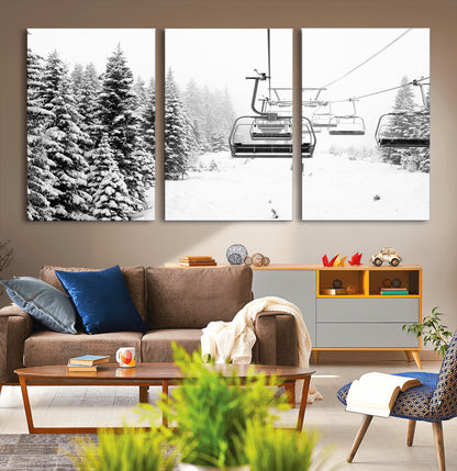 Black and white canvas of empty ski lifts over a snowy pine forest, perfect for minimal winter or ski lodge-inspired decor.