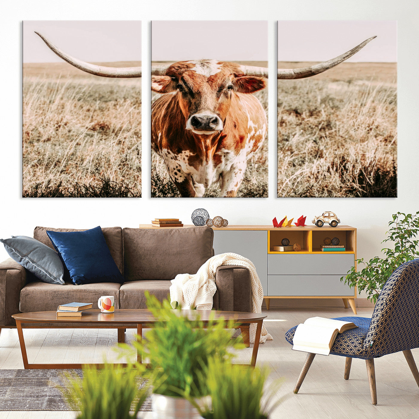 Framed longhorn cow canvas wall art with rustic prairie background, western animal print perfect for farmhouse or ranch style decor
