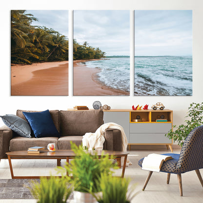 Framed canvas of a tropical beach with palm trees and soft waves, ideal for coastal escape or serene nature-inspired home decor.