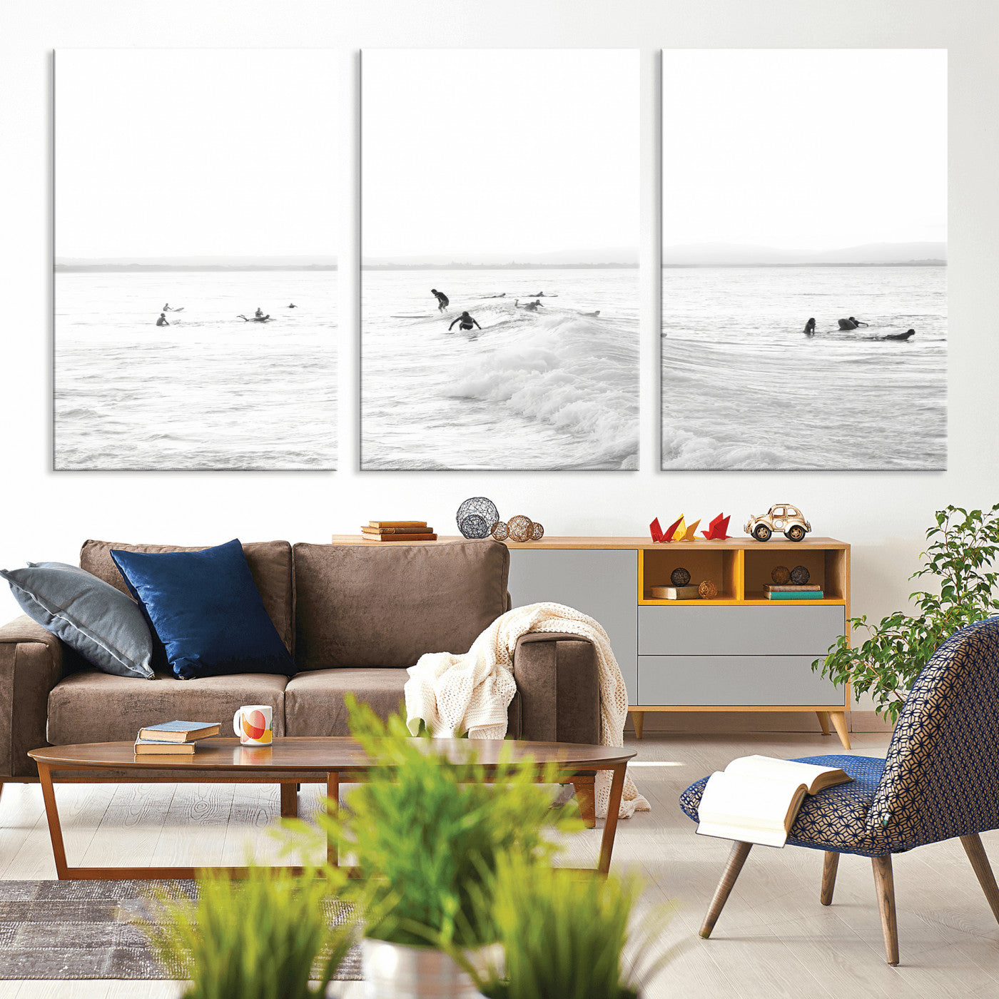 Monochrome photo of surfers riding and waiting on ocean waves, ideal for surf-themed or coastal energy wall decor.