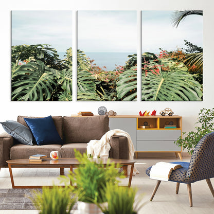 Monstera leaves and tropical flowers framing a calm ocean view, ideal for tropical coastal or exotic jungle-style interior wall decor.
