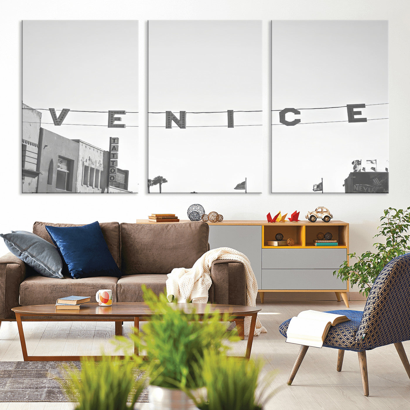 Black and white photo of Venice Beach sign and palm-lined street, perfect for urban coastal or minimalist LA-inspired wall decoration.