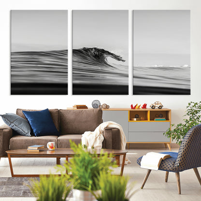 Striking black and white photo of a curling wave, ideal for modern coastal or minimalist wall decor settings.