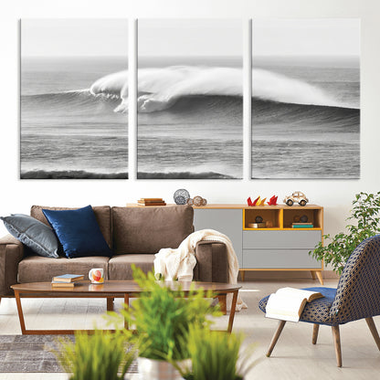 A dramatic black and white ocean wave crashing with immense force, capturing the raw power and movement of the sea in a bold seascape.