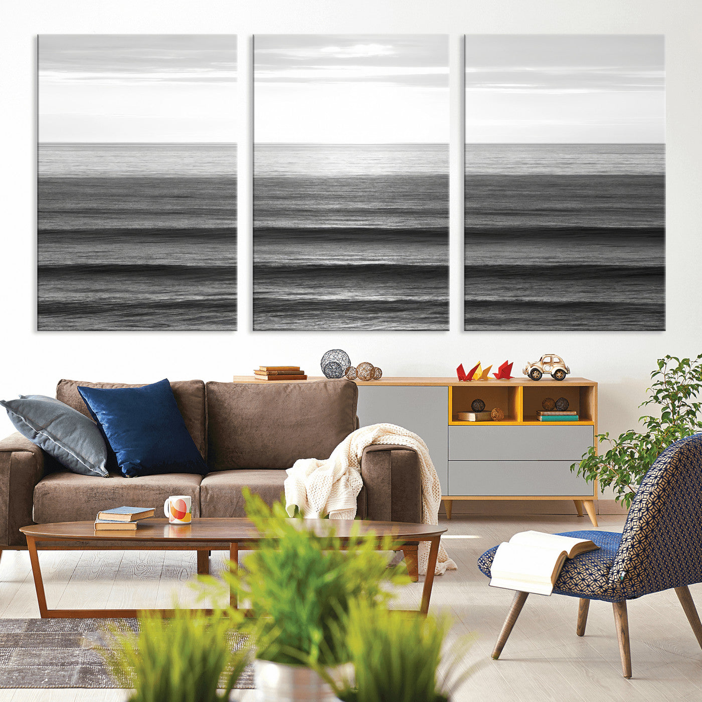 Minimalist black and white ocean view with layered waves reflecting sunlight, evoking a sense of calm and coastal serenity.