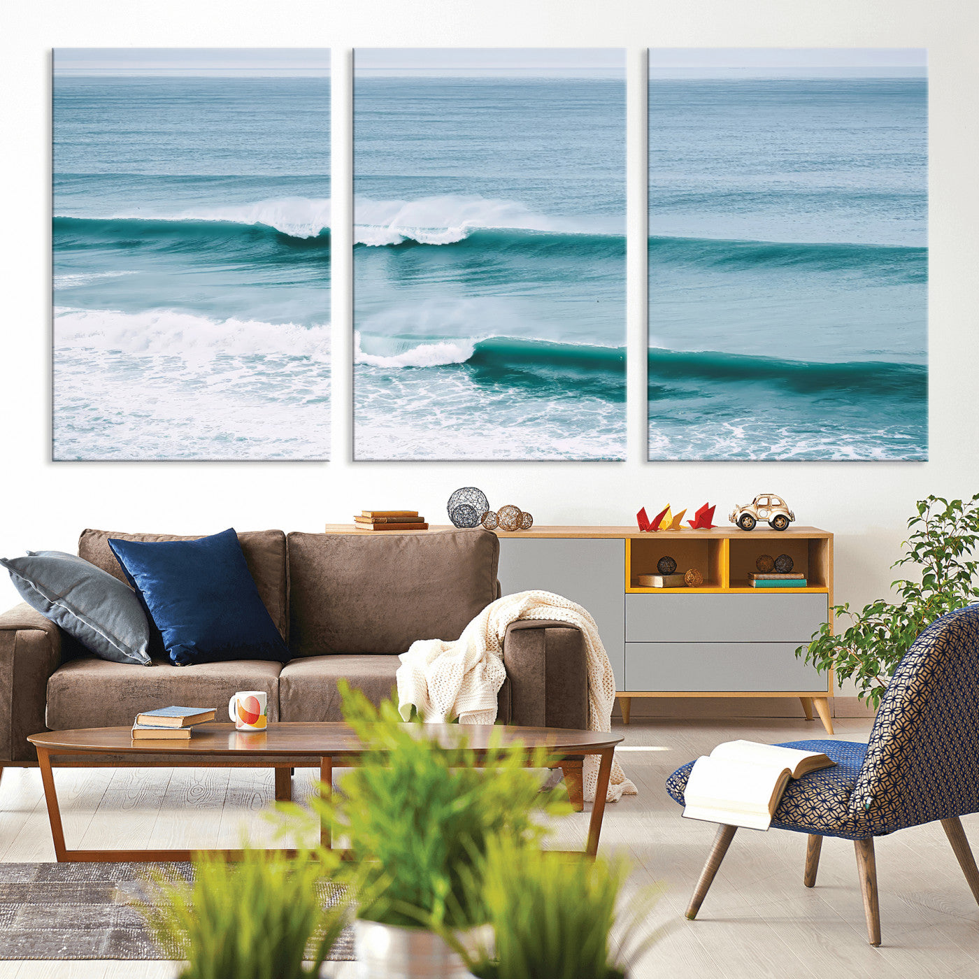 Powerful ocean waves rolling towards the shore, their turquoise hues blending with white sea foam under an open horizon, capturing the essence of the ocean's movement.