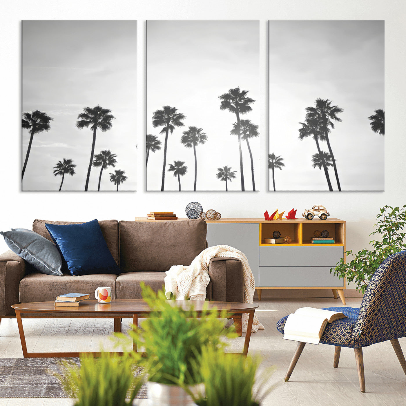 A black and white minimalist scene featuring tall palm trees silhouetted against a bright sky, creating a dreamy and timeless tropical aesthetic.