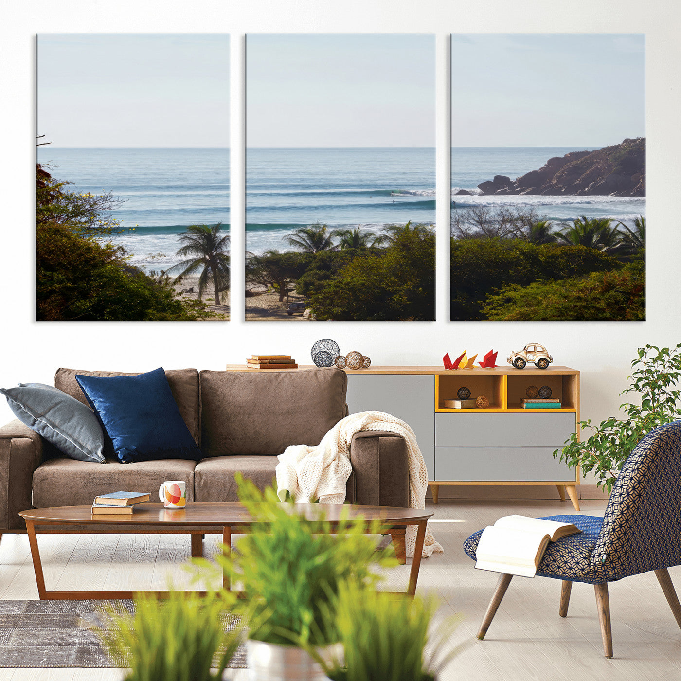 View of calm ocean waves with palm trees and a tropical coastline, ideal for coastal boho or beach-themed wall decor.