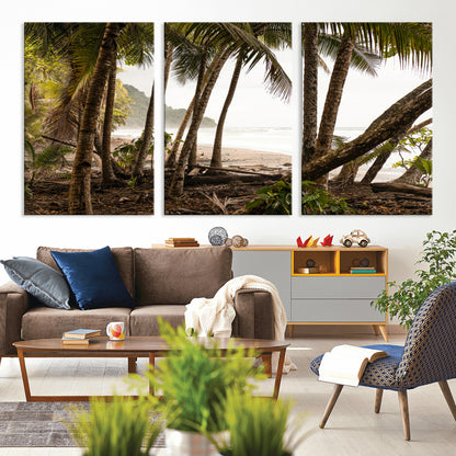 Dense tropical palm trees framing a sandy beach and ocean shore, ideal for jungle or coastal themed interior wall decor.