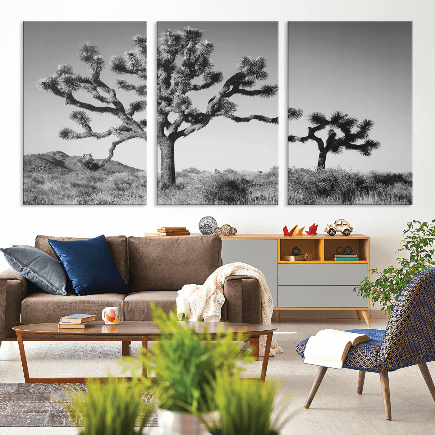 Black and white Joshua trees in a rugged desert landscape, creating a calm and minimalist feel for natural or rustic-themed interiors.