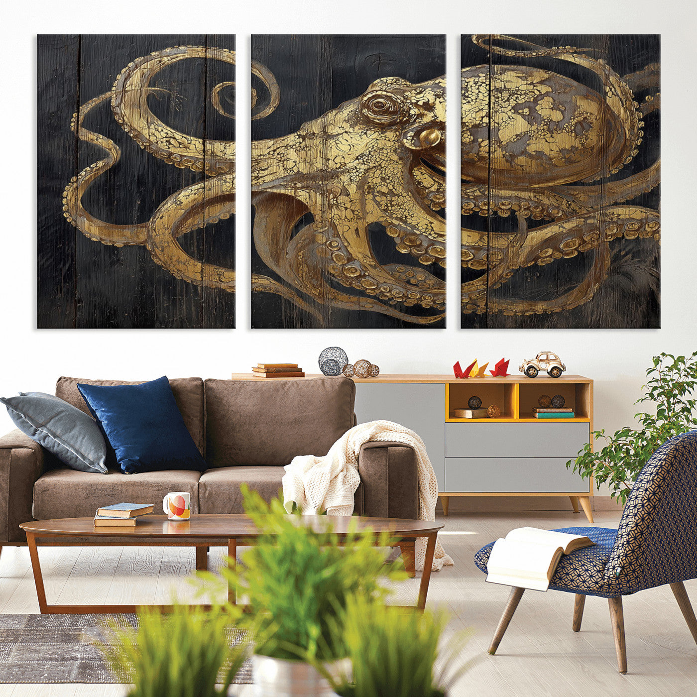 A detailed gold illustration of an octopus on black wooden planks, showing its intricate tentacles and textured skin in an artistic style.